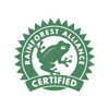 A green circular emblem with a frog silhouette in the center. The text RAINFOREST ALLIANCE CERTIFIED encircles the frog. The badge features a jagged edge resembling a seal or stamp.
